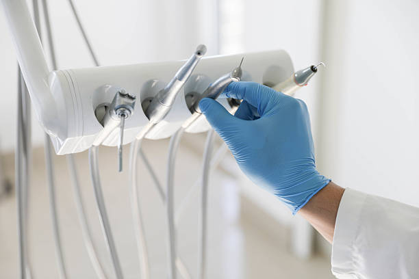 Professional Tooth Extraction technician working in Bellville, OH